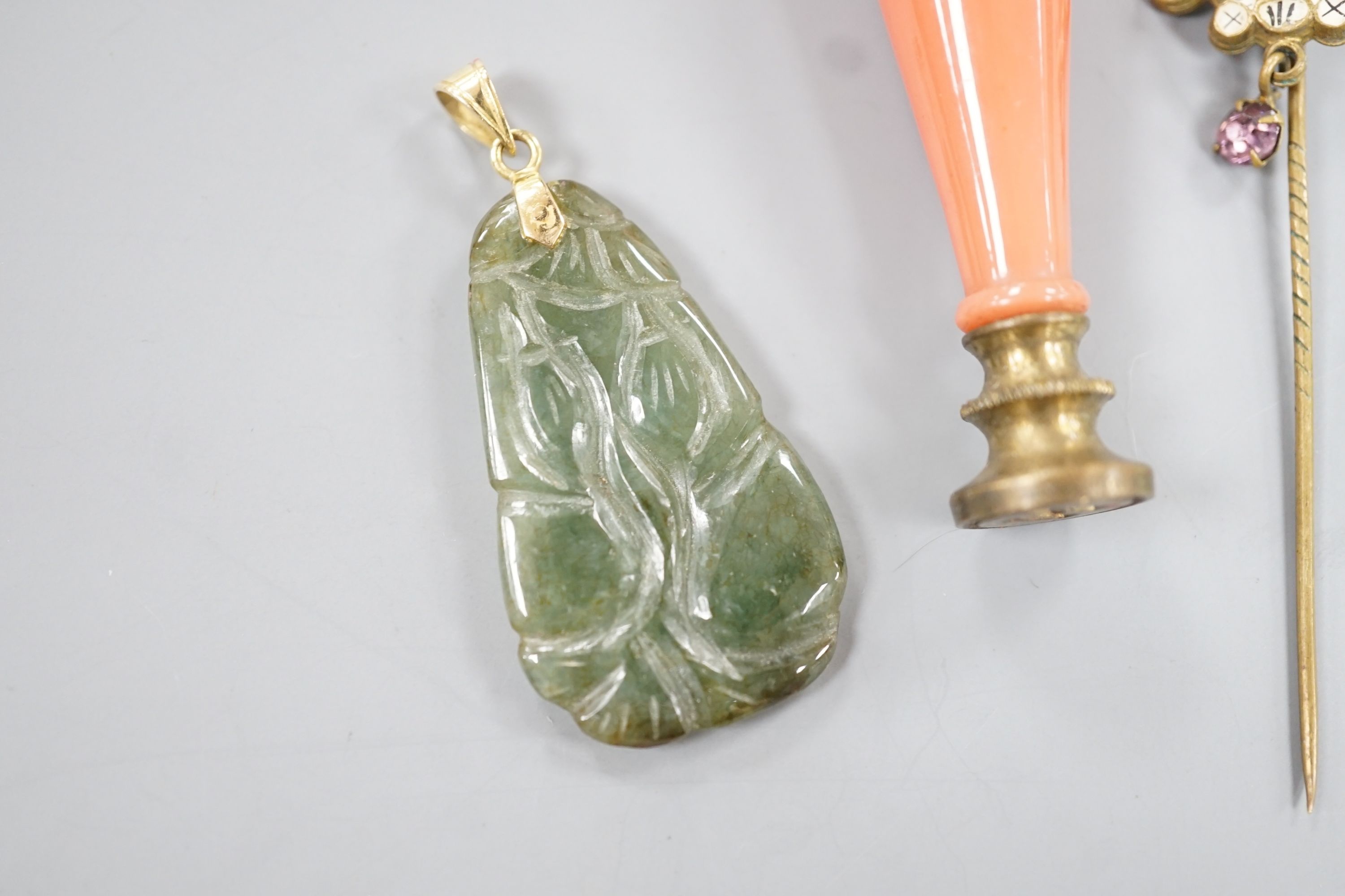 An 18k mounted jade set teardrop shaped pendant, 36mm and three other items of jewellery, including a seal and stick pin.